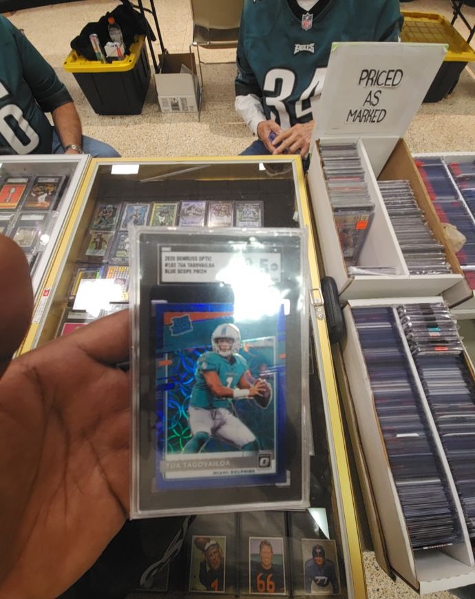 2020 Donruss Optic #168 Tua Tagovailoa Blue Scope Prizm — front