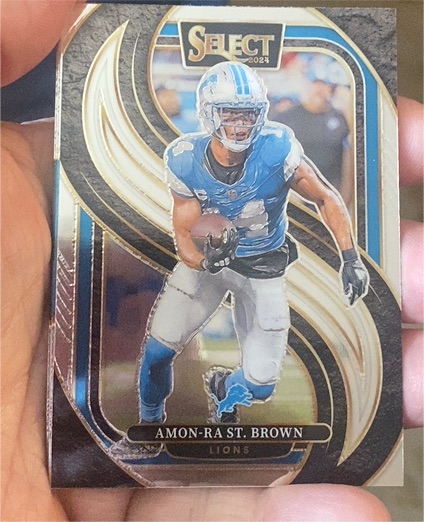 2024 Panini Select Premier Level #105 Amon-Ra St. Brown — front
