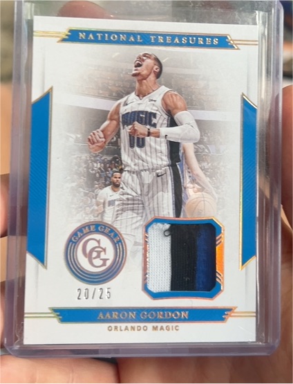 2019 Panini National Treasures Game Gear #GG-AG Aaron Gordon — front