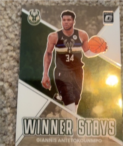 2022-23 Panini Donruss Optic #12 Giannis Antetokounmpo Winner Stays — front