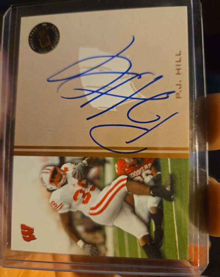 2009 Press Pass Autographs Bronze #PH P.J. Hill — front