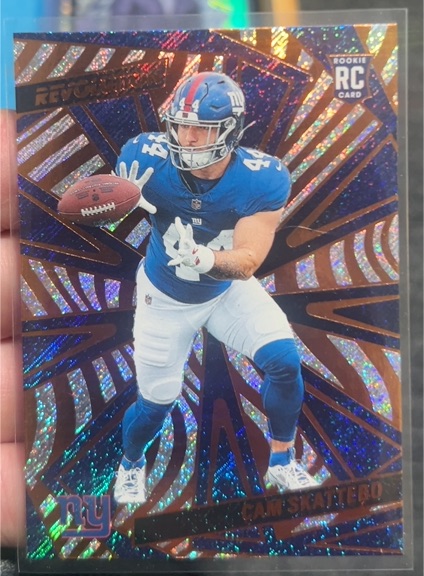 2025 Panini Revolution #207 Cam Skattebo — front