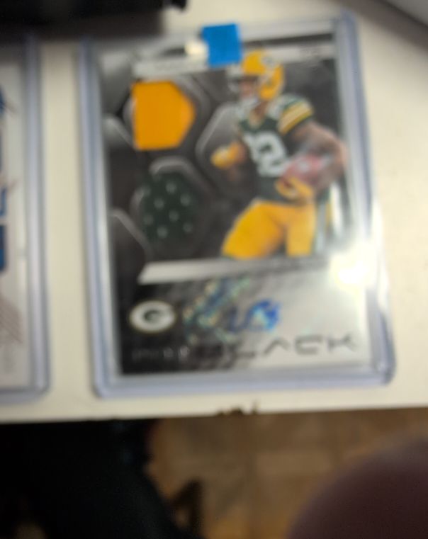 2023 Panini Black #RPA Aaron Jones — front