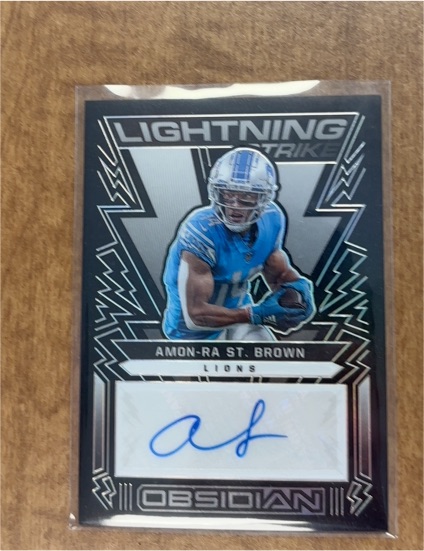 2022 Panini Obsidian Lightning Strike #LS-ARS Amon-Ra St. Brown — front