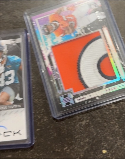2020 Panini National Treasures Crossover Rookie Patch Auto Tee Higgins #/99 — front
