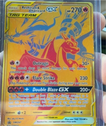 2021 Pokémon TCG SM Promos #SM247 Reshiram & Charizard GX — front