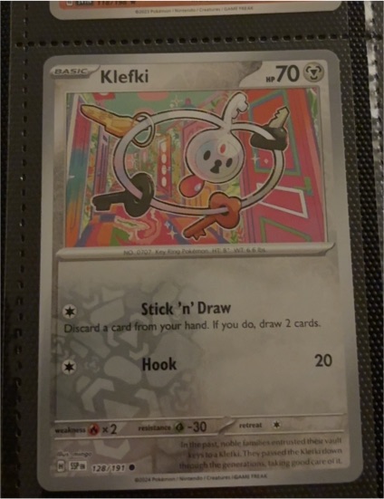 2024 Pokemon SV08 Surging Sparks #128 Klefki — front