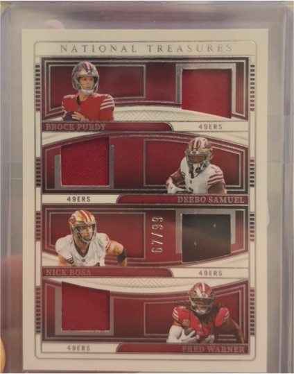 2024 Panini National Treasures NFL Gear Quad Patch #/99 Brock Purdy Deebo Samuel Nick Bosa Fred Warner — front