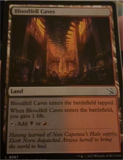 2023 Magic: The Gathering March of the Machine #267 Bloodfell Caves — front
