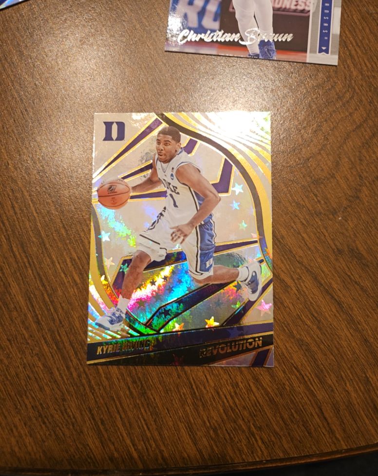 2022-23 Panini Chronicles Draft Picks Revolution Astro #63 Kyrie Irving — front