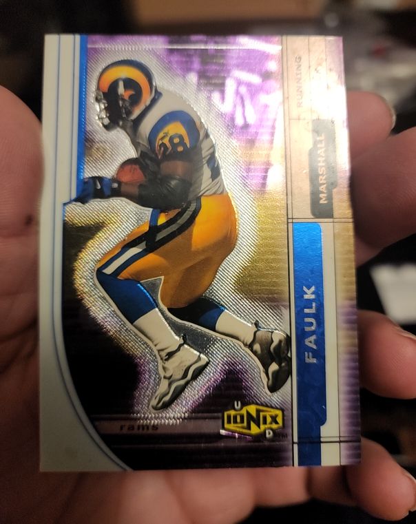 2000 Upper Deck Ionix #47 Marshall Faulk — front