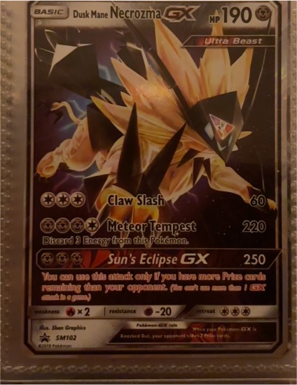 2018 Pokémon SM Black Star Promo #SM102 Dusk Mane Necrozma GX — front