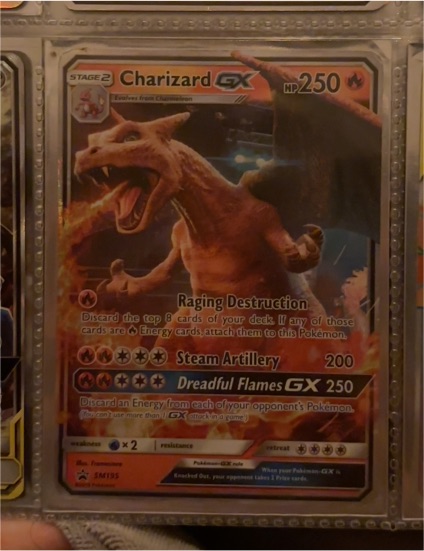 2019 Pokémon TCG Charizard GX #SM195 — front