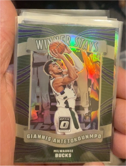 2023-24 Donruss Optic #1 Giannis Antetokounmpo Winner Stays — front