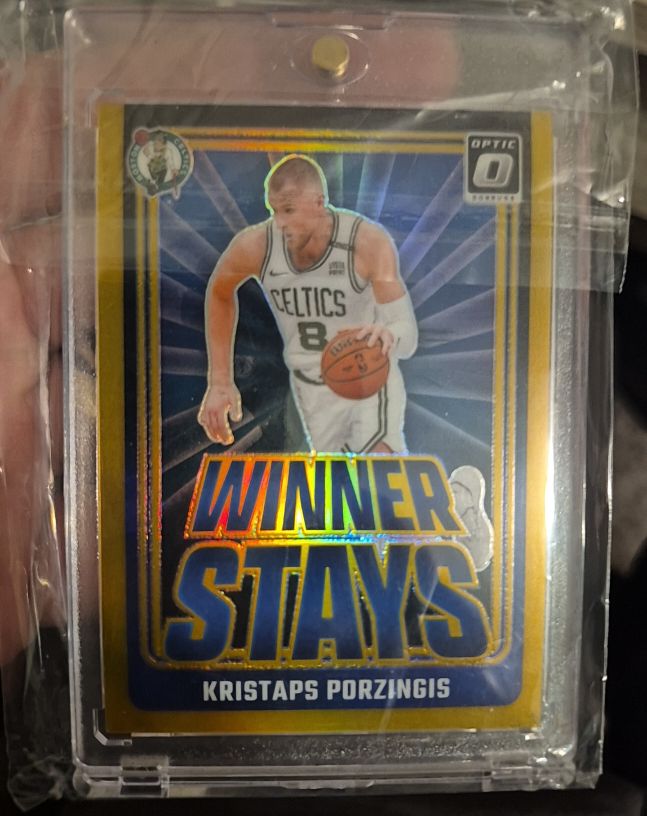 2024-25 Panini Donruss Optic #9 Kristaps Porzingis Winner Stays — front