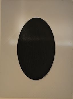 Black Oval Dust Cap — front