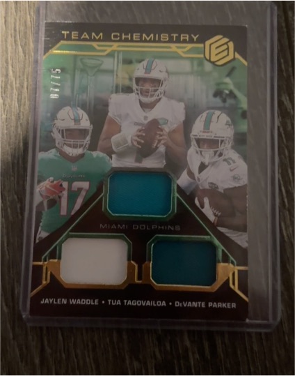 2021 Panini Elements Team Chemistry #TC-MIA Jaylen Waddle, Tua Tagovailoa, DeVante Parker — front