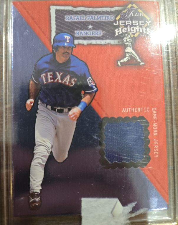 2002 Fleer Flair Jersey Heights #19 Rafael Palmeiro — front