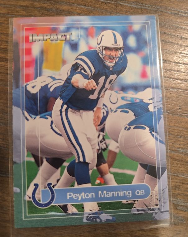 2000 Fleer Skybox Impact #100 Peyton Manning — front