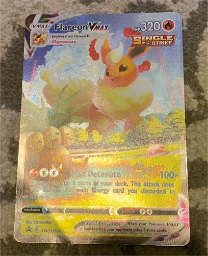 2021 Pokémon Sword & Shield Black Star Promo #SWSH180 Flareon VMAX — front