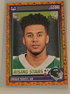 2024 Panini Score-A-Treat #31 Jordan Travis Rising Stars Orange Pumpkin RC — front