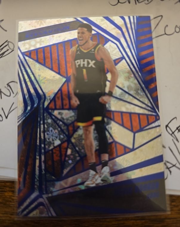 2023-24 Panini Revolution #99 Devin Booker Winter — front