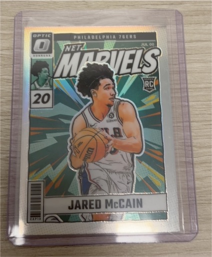 2024-25 Panini Donruss Optic #23 Jared McCain Net Marvels Rookie — front