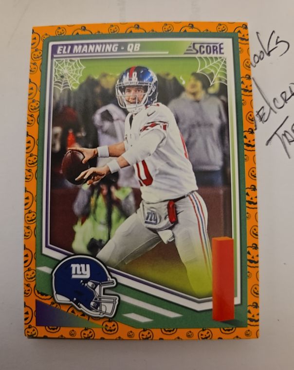 2025 Panini Score-A-Treat #78 Eli Manning — front