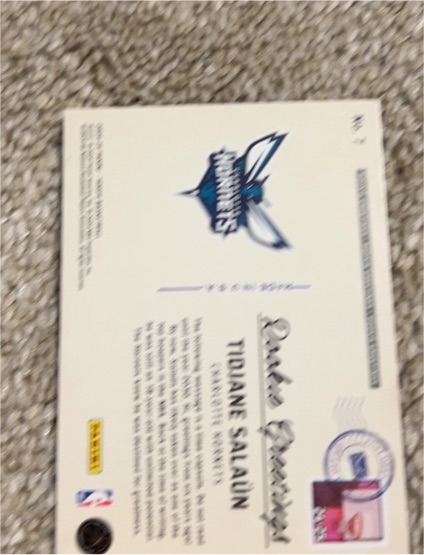 2024-25 Panini National Treasures Rookie Booklet Patch Auto #34 Tidjane Salaun — front