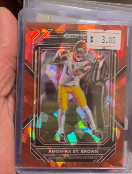 2023 Panini Prizm Draft Picks Red Ice Prizm #1 Amon-Ra St. Brown — front