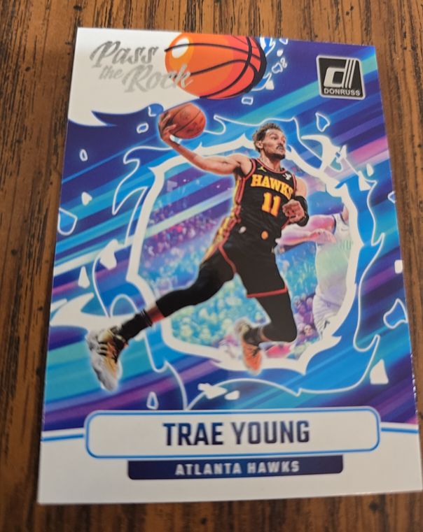 2024-25 Panini Donruss #9 Pass the Rock Trae Young — front
