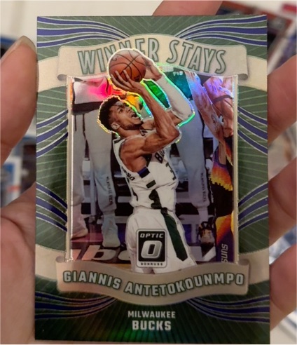 2023-24 Panini Donruss Optic #1 Giannis Antetokounmpo Winner Stays — front