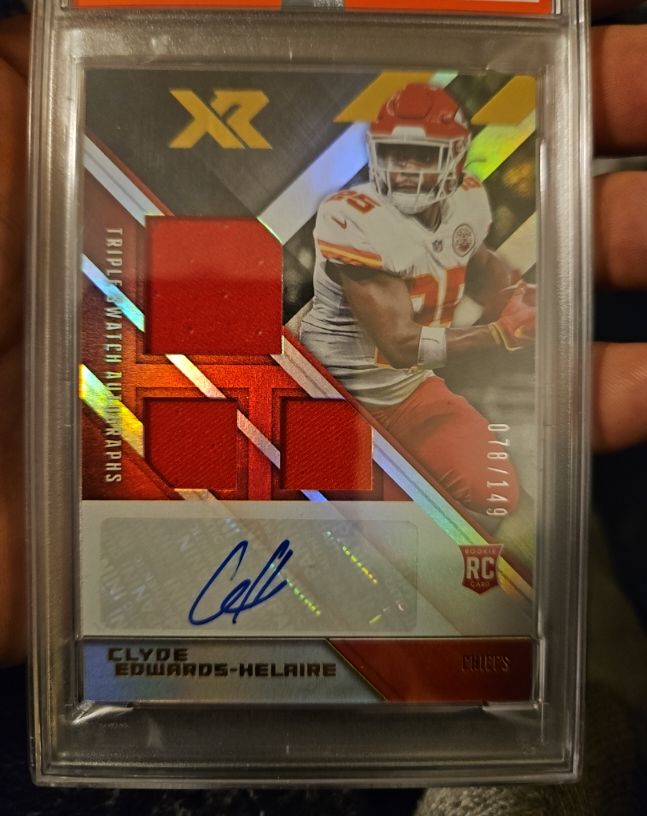 2020 Panini XR #RC Clyde Edwards-Helaire Rookie Triple Swatch Autographs — front