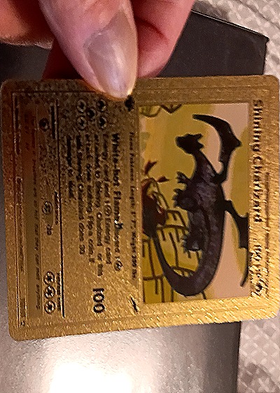 2000 Pokémon Shining Charizard #107/105 — front