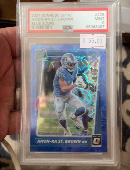 2021 Donruss Optic #228 Amon-Ra St. Brown Blue Scope — front