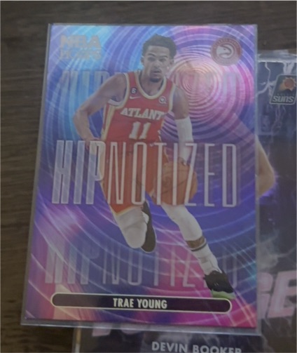 2023-24 Panini NBA Hoops #7 Trae Young Hipnotized — front