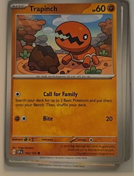 2024 Pokémon Scarlet & Violet Surging Sparks #104 Trapinch — front