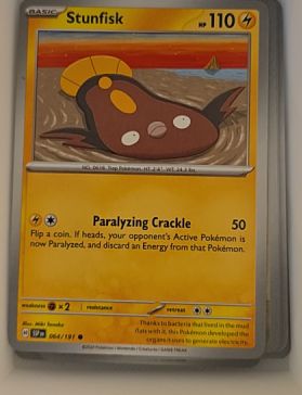 2023 Pokémon SV08: Surging Sparks #064 Stunfisk — front