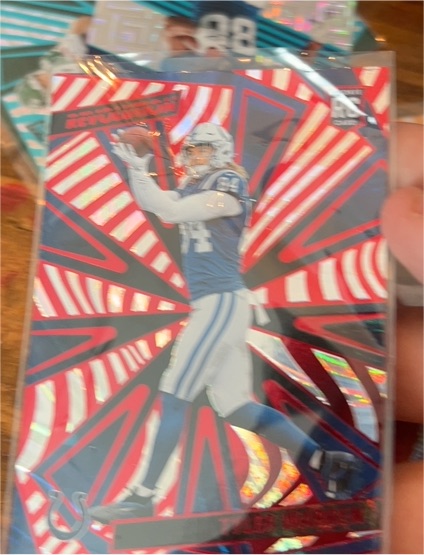 2025 Panini Revolution Red Swirl #234 Michael Pittman Jr. — front
