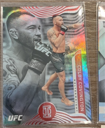 2022 Panini Chronicles UFC Illusions #267 Colby Covington — front