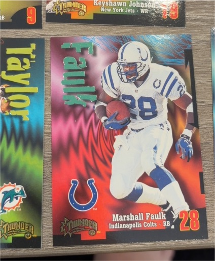 1998 Skybox Thunder #28 Marshall Faulk — front