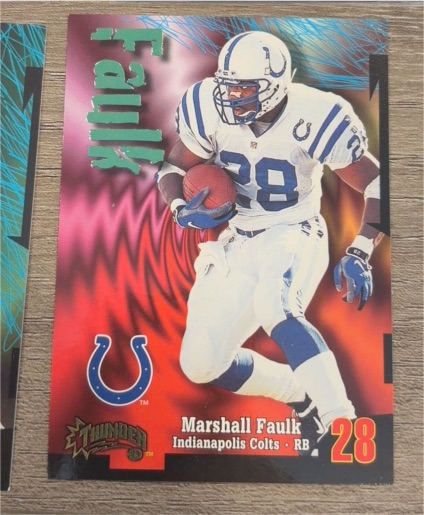 1998 SkyBox Thunder #165 Marshall Faulk — front