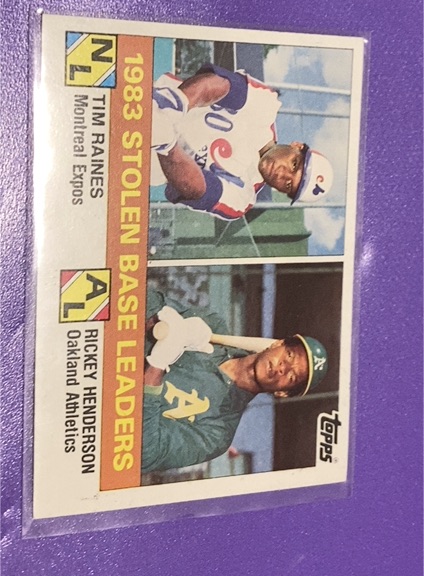 1984 Topps #134 1983 Stolen Base Leaders Tim Raines Rickey Henderson — front