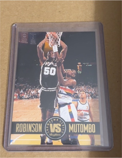 1993-94 SkyBox Showdown Series #SS6 David Robinson vs Dikembe Mutombo — front