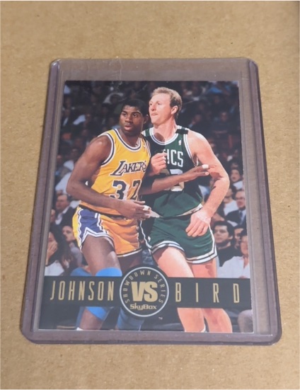 1994 SkyBox Showdown Series #SS12 Magic Johnson vs Larry Bird — front