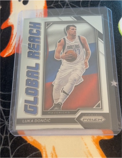 2022-23 Panini Prizm #10 Luka Doncic Global Reach Silver Prizm — front