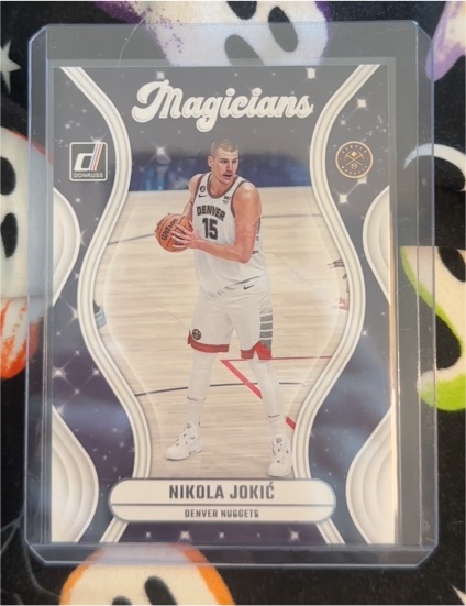 2023-24 Panini Donruss #7 Nikola Jokić Magicians — front