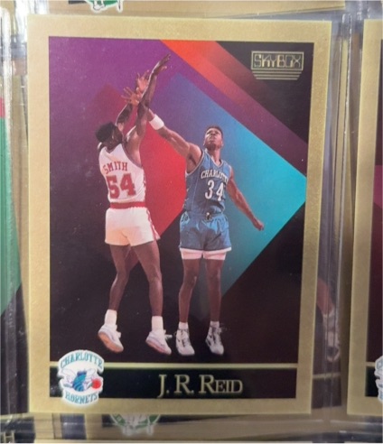 1990-91 SkyBox #32 J.R. Reid — front