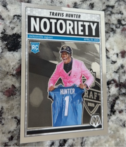 2025 Panini Mosaic Notoriety #12 Travis Hunter — front