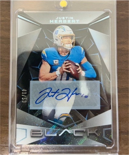 2024 Panini Black #50 Justin Herbert — front
